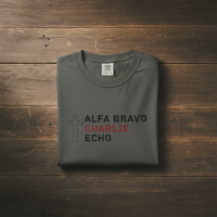 Load image into Gallery viewer, Alpha Bravo Charlie Echo Cross T-Shirt — Christian Faith Based in memory of Charlie Kirk , Made for believers who stand for biblical values, strong families, religious freedom, and principled...