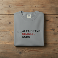Load image into Gallery viewer, Alpha Bravo Charlie Echo Cross T-Shirt — Christian Faith Based in memory of Charlie Kirk , Made for believers who stand for biblical values, strong families, religious freedom, and principled...